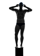 Wall Mural - young man swimmer swimming silhouette