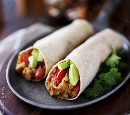 Fotomural two vegan burritos with avocado, tomato and lentils
