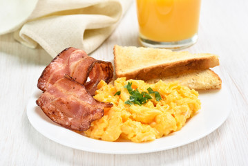 Breakfast with scrambled eggs and bacon