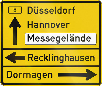 German direction sign showing various places including Hannover and Duesseldorf on the federal road B 8. Messegelaende means fairground