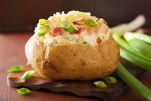 Baked Potato In Jacket With Bacon And Cheese