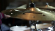 Close Up Shot Of Musican Playing Drums