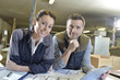 © goodluz - Portrait of smiling workers in carpentry workshop