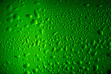 Texture Water Drops On The Bottle Of Beer.