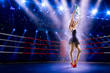 © 103tnn - Boxing ring girl  is holding the number