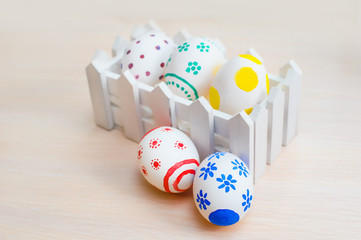 easter eggs in a paper holiday bag, Easter eggs on wooden backgr