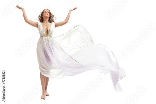 Fotografie, Obraz Classical Greek Goddess in Tunic Raising Arms