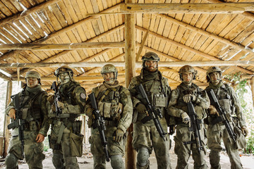 Wall Mural - group of soldiers standing and looking at the camera