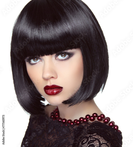 Fototapeta na wymiar Black short bob hairstyle. Fashion brunette girl model with make