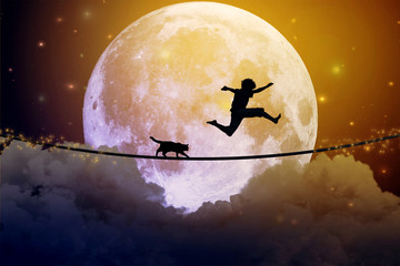 teenager and cat walking jumping on tight rope above clouds