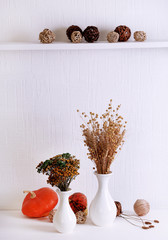 Canvas Print - Composition of dried flowers on white wall background