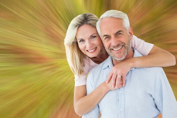 Aufkleber - Smiling couple embracing and looking at camera