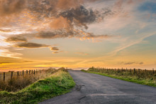 Sunset Over A Country Road