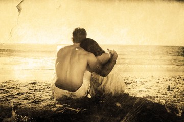 Aufkleber - Composite image of couple sitting on the sand watching the sea