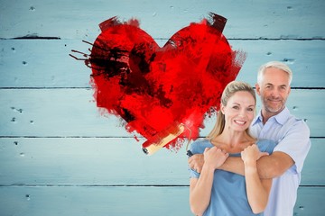 Aufkleber - Composite image of happy couple hugging and holding paint roller