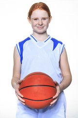 A teenager basketball player over a white background