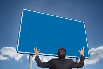 Poster - Composite image of gesturing businessman