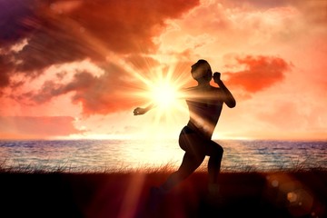 Aufkleber - Composite image of fit brunette running and jumping