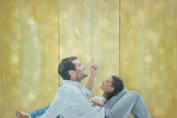 Poster - Composite image of attractive young couple lying down