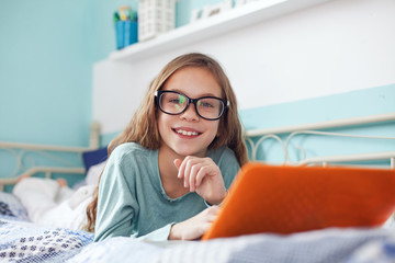 Wall Mural - Child using laptop