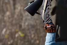Hunter Wears Ammunition Belt