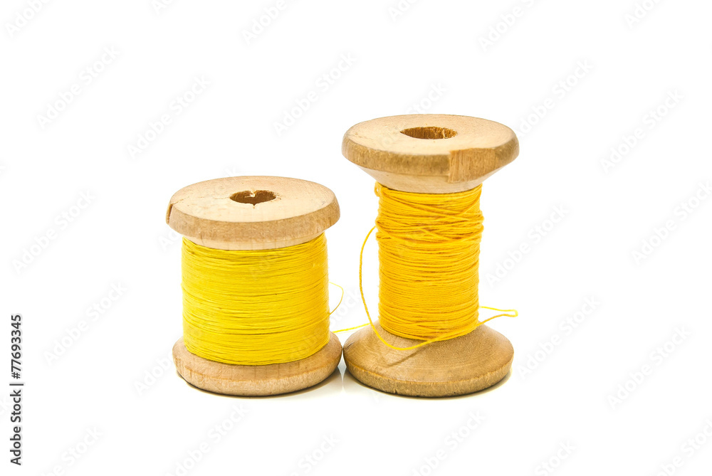 spools of yellow thread