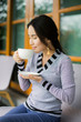 Woman eating a delicious coffee