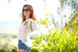 © ZoomTeam - Smiling summer woman with hat and sunglasses
