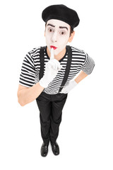 Canvas Print - Mime artist holding a finger on his lips