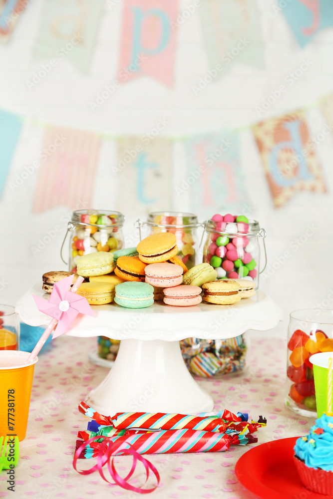 Prepared birthday table with sweets for children party