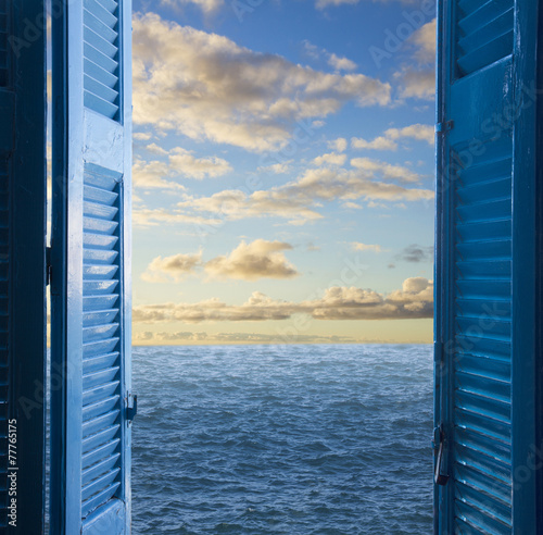 Fototapeta do kuchni room with open door to seascape