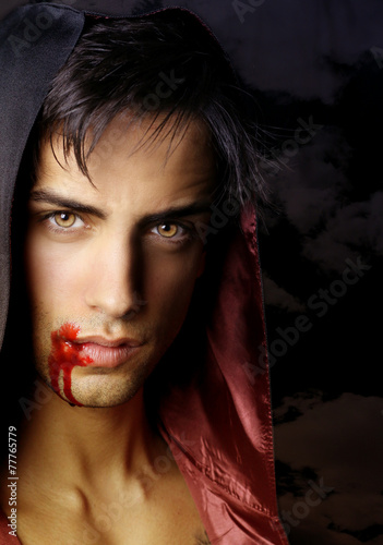 Fotomural Portrait of a handsome vampire who comes to attack prey