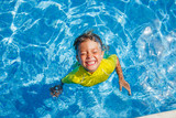 Fototapeta Mapy - Boy in the pool
