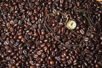 Wall Mural - Pocket watch buried in coffee beans