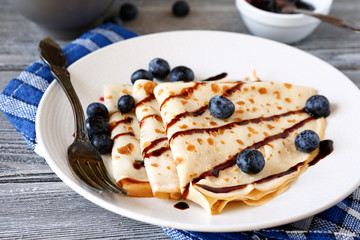 Poster - crepes with fresh blueberries on a plate