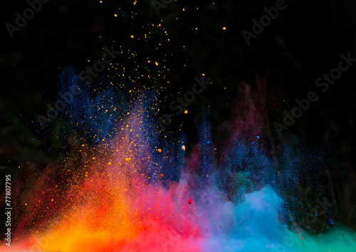 launched colorful powder over black