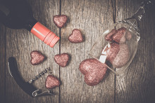 Wine Glass, Corkscrew And Wine With Red Hearts On Valentine's Da
