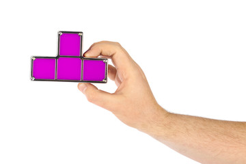 Wall Mural - Hand with tetris toy blocks