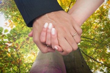 Aufkleber - composite image of newlyweds holding hands close up