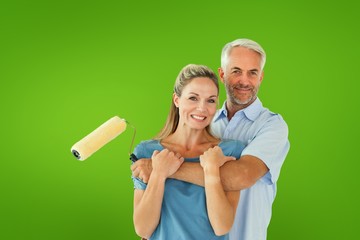 Aufkleber - Composite image of happy couple hugging and holding paint roller