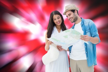 Poster - Composite image of happy hipster couple looking at map
