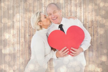 Aufkleber - Older affectionate couple holding red heart shape