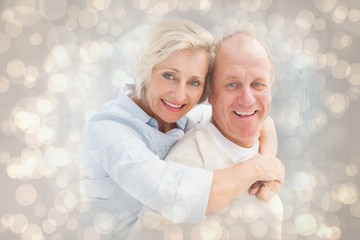 Aufkleber - Composite image of happy mature couple smiling at camera