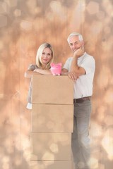 Aufkleber - Happy couple leaning on pile of moving boxes