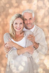 Aufkleber - Composite image of happy couple standing and hugging