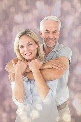 Aufkleber - Composite image of happy couple standing and hugging