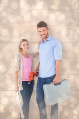 Aufkleber - Composite image of young couple holding diy tools