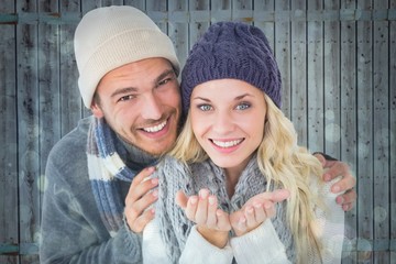 Poster - Attractive couple in winter fashion smiling at camera