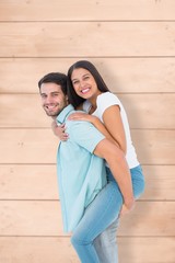 Poster - Happy casual man giving pretty girlfriend piggy back
