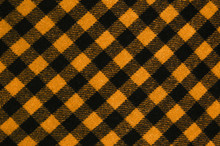 Checkered Wool Fabric. Orange Gingham Pattern Background.